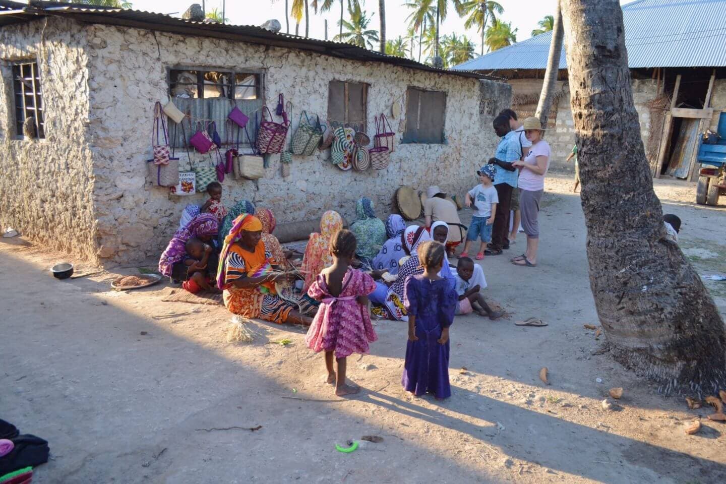 Tourist enjoying Village Tour & Traditional Cooking Class in Zanzibar - Cultural & Historical tour experience